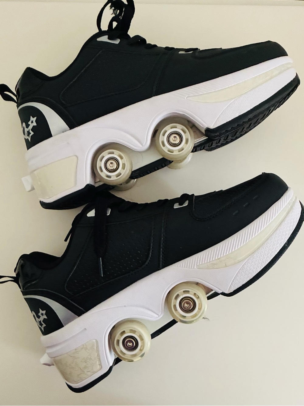 Black Rolling Sneakers with White Sole
